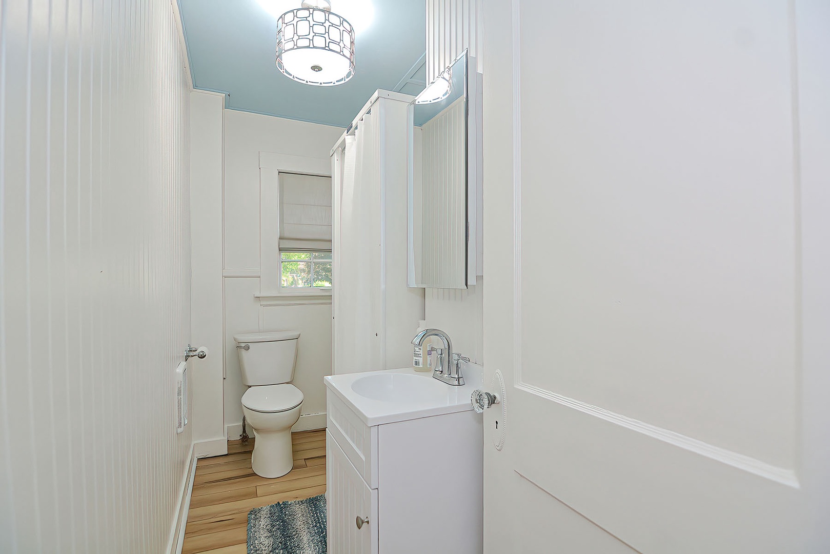 Bathroom with walk-in shower.