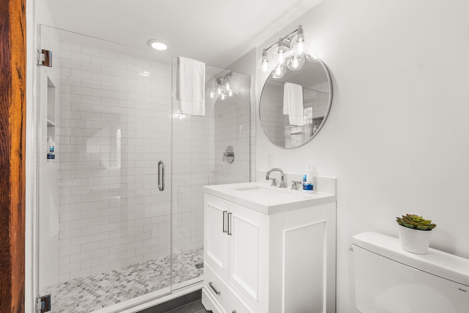 The en-suite bathroom of the primary bedroom with a large walk-in shower.