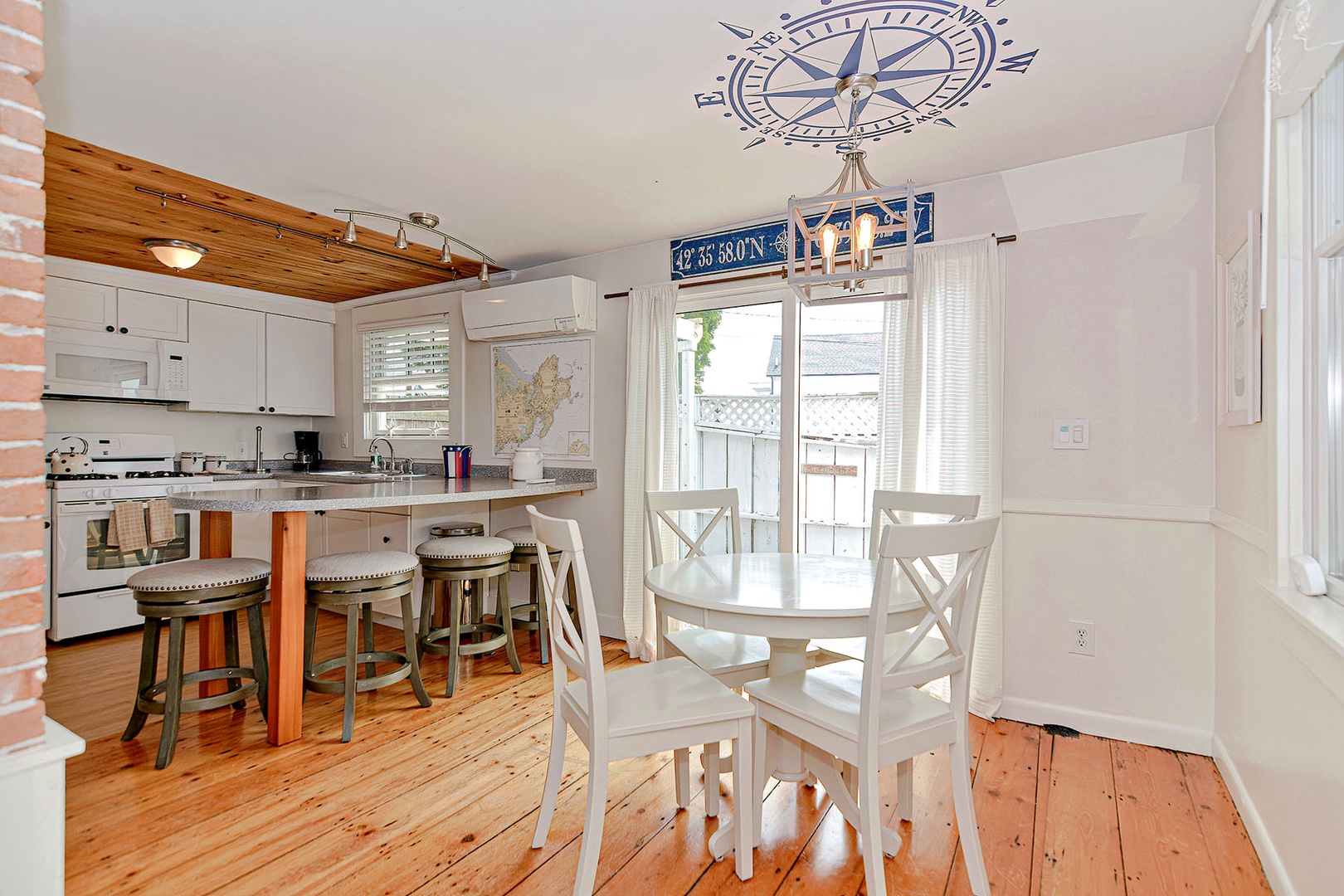 There is a spacious and airy eat-in kitchen.