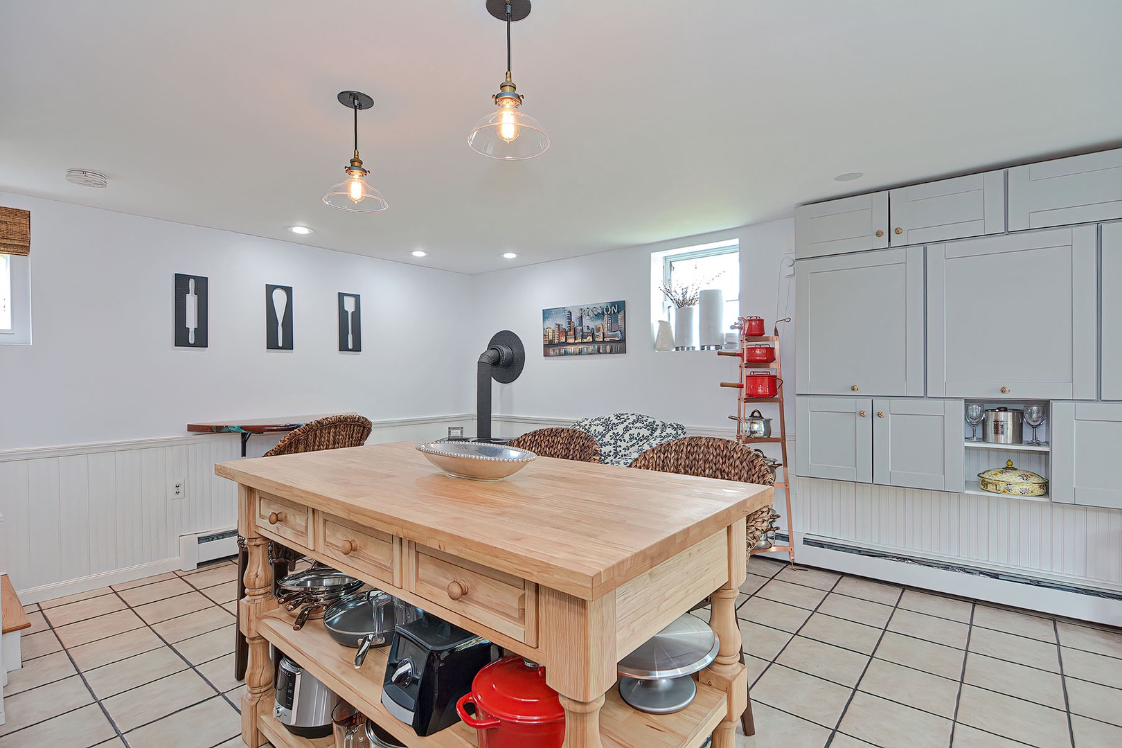 Dine at the kitchen island or at the wall-mounted table.