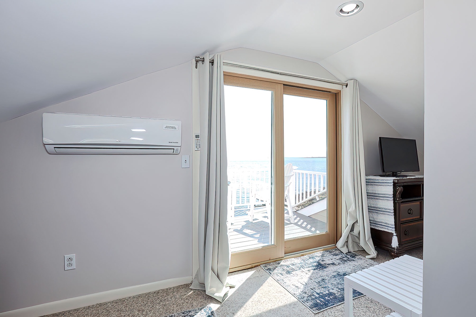 Sliders take you out to the balcony.