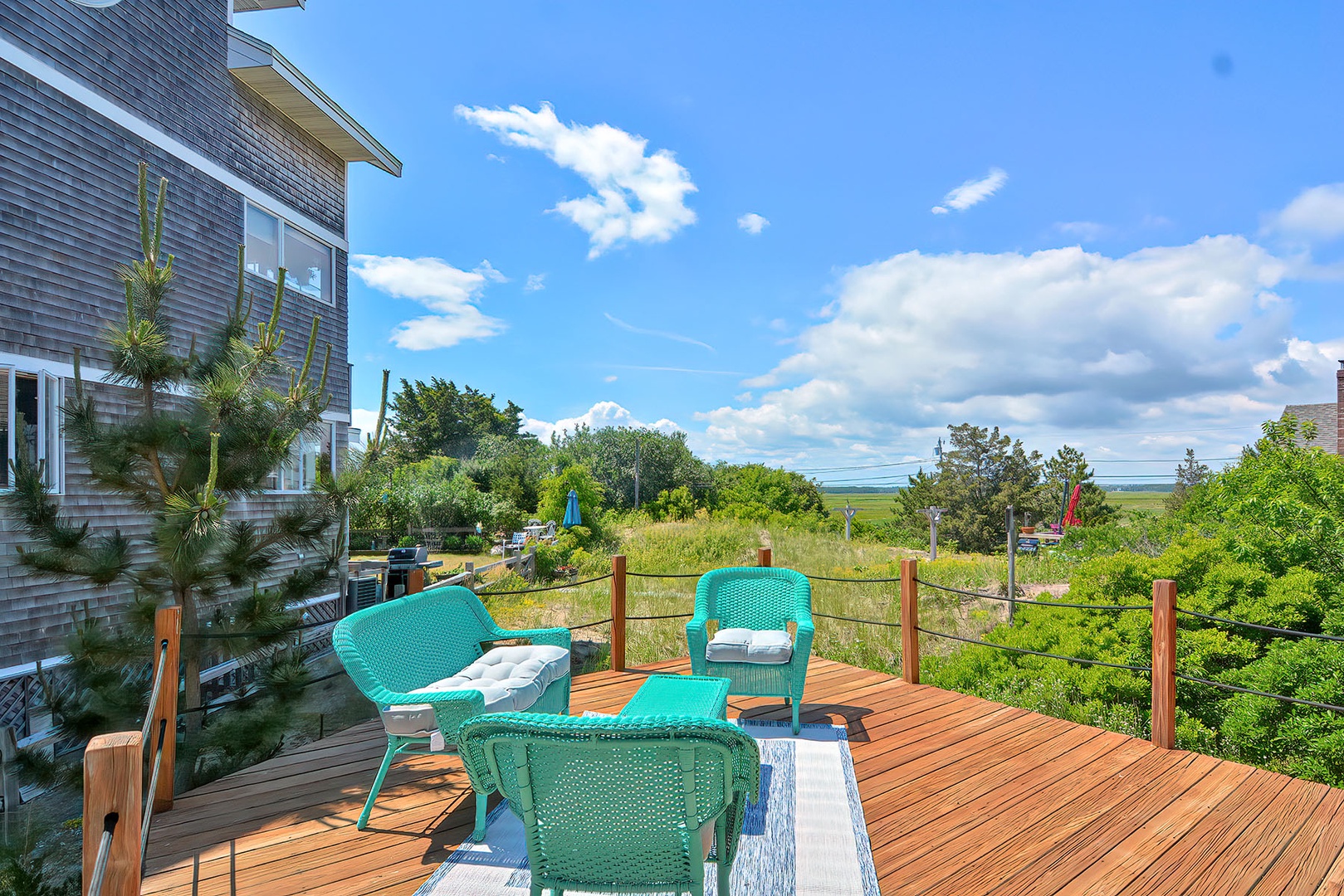 From this deck, there are views of the marsh.