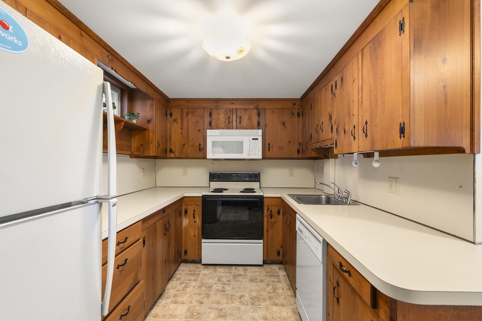 Secondary fully-equipped kitchen in the lower floor.