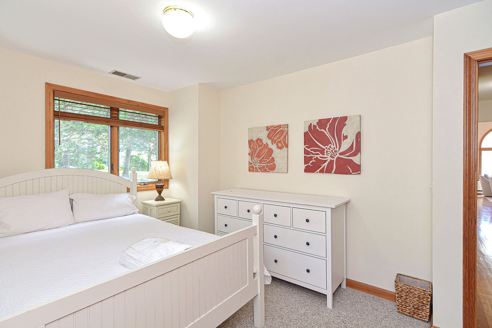 The primary bedroom has a King bed, ensuite bath, and walk-in closet.