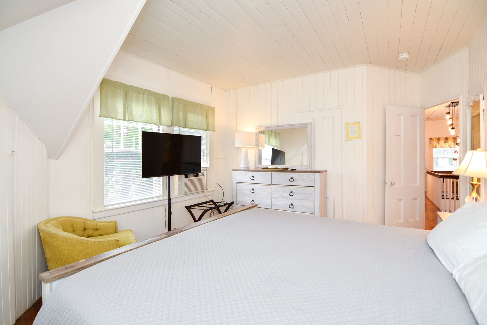 Watch tv in the comfort of the Primary bedroom.