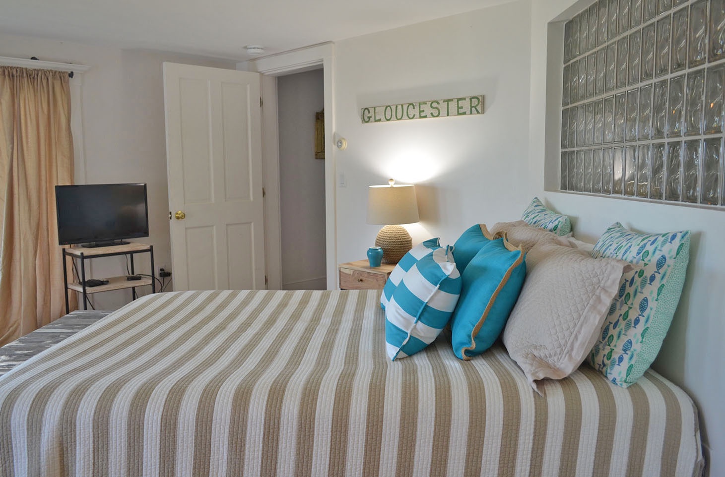 Bedroom 1 offers a flat-screen TV.