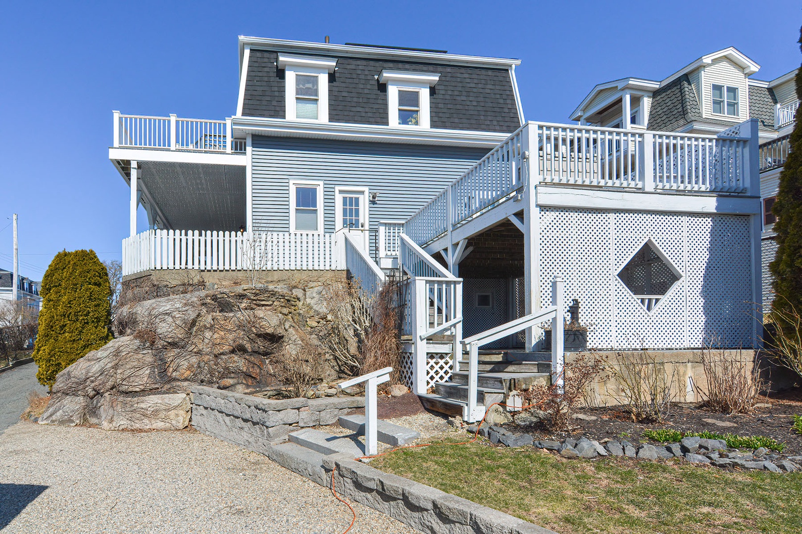 Stairs from the driveway up to the unit.