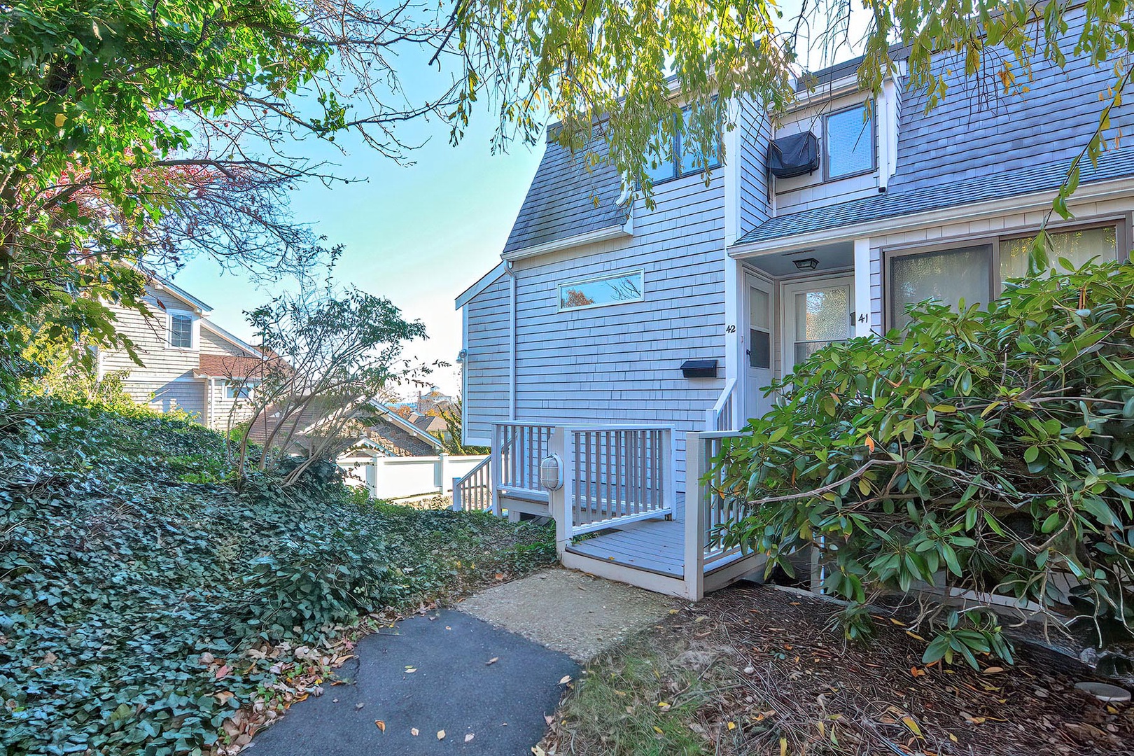 The paved path leading to the rental unit.