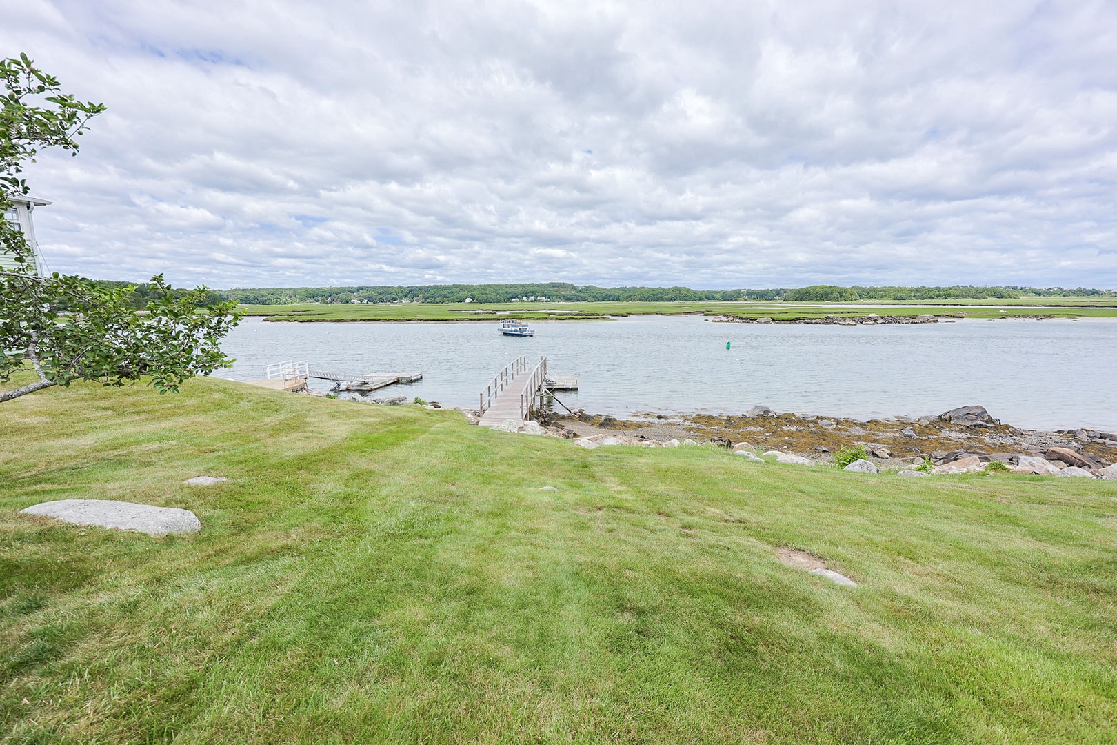 Private dock is just across the large yard.