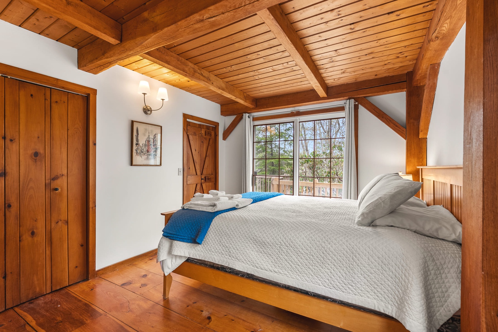 The primary bedroom with a queen bed.