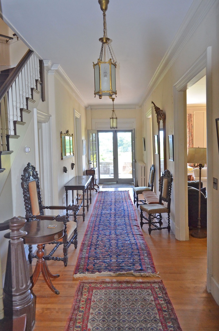 The main hall, with the living room to the right.