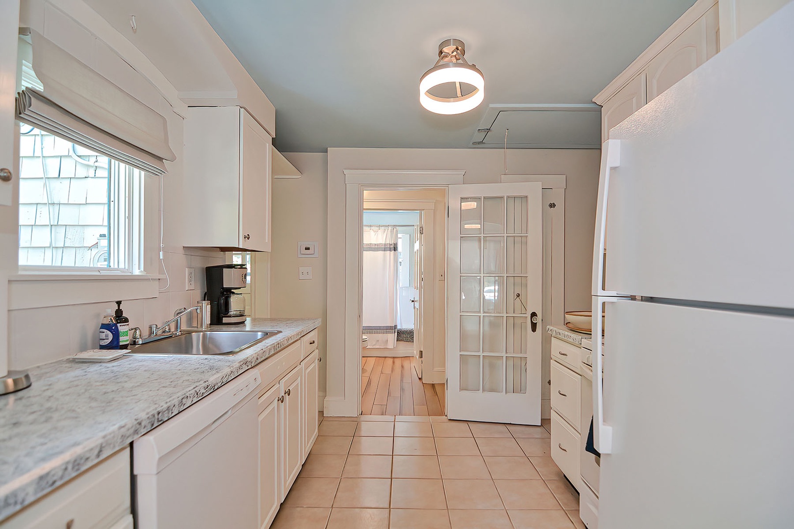 Kitchen, looking toward the front door.