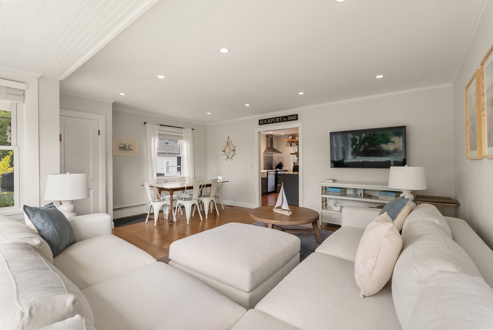 The living room is spacious and brings in plenty of natural light.