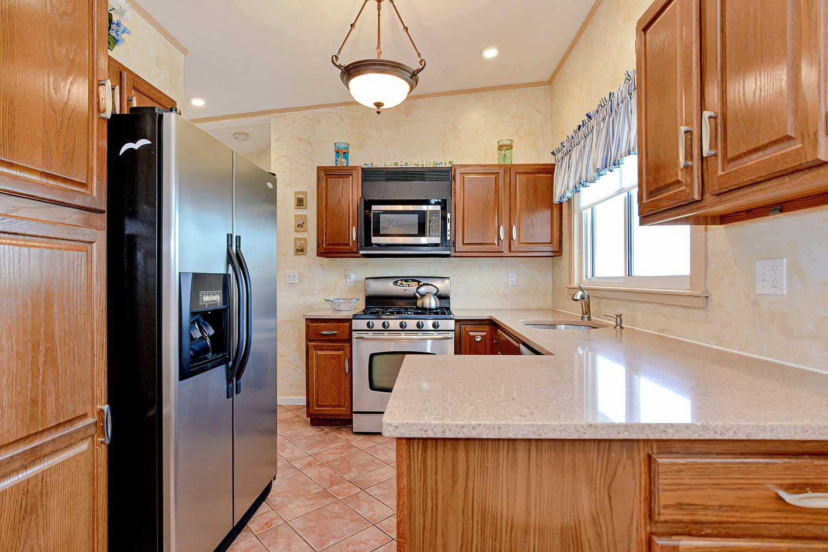 A fully equipped kitchen with ample drawer space.