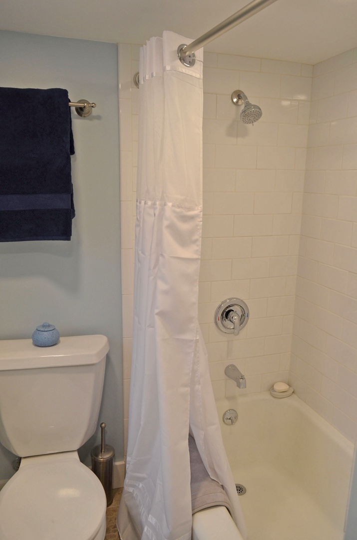 The upstairs full bath has a tub/shower combo.