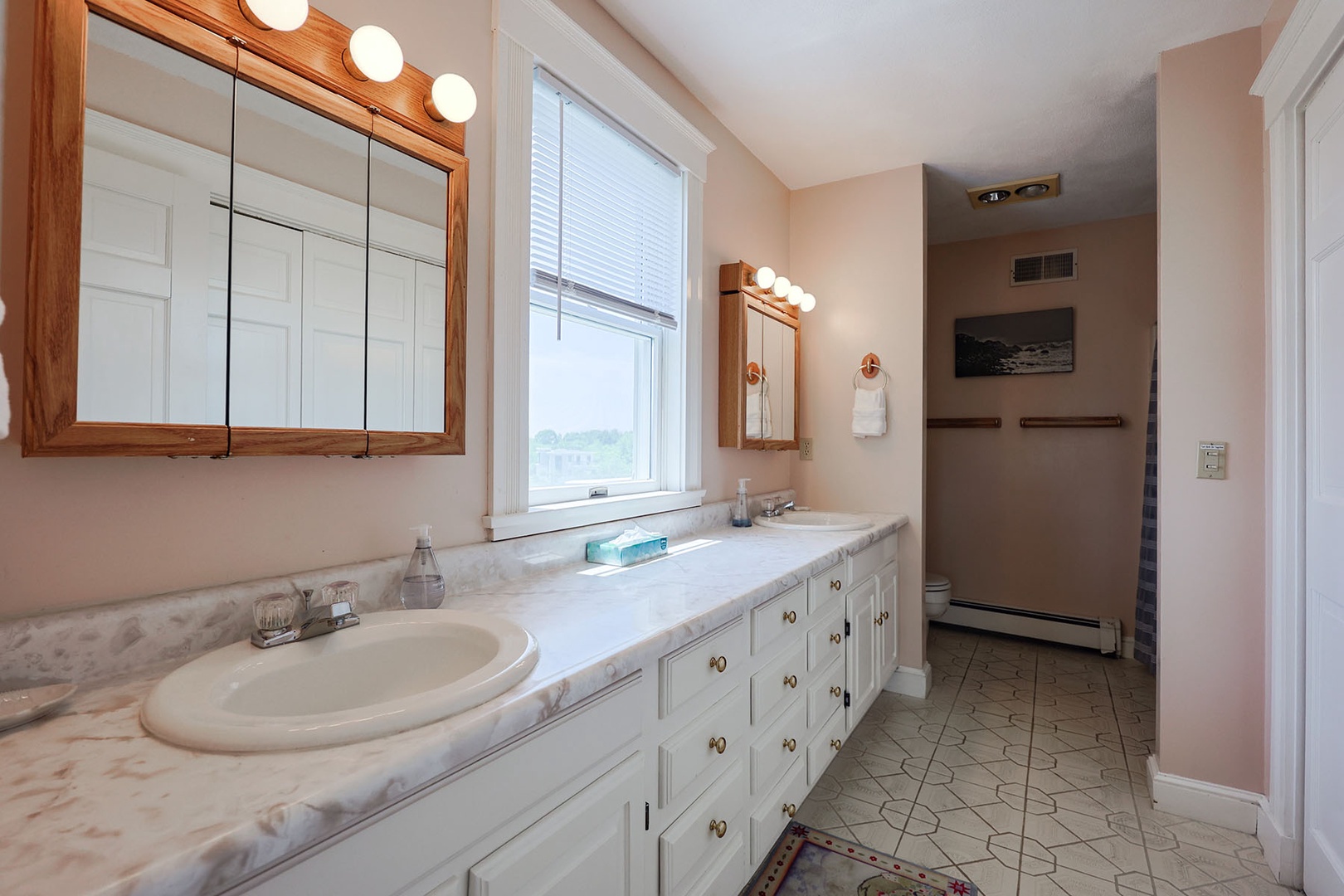 Second rrimary bedroom ensuite bath has a double vanity.