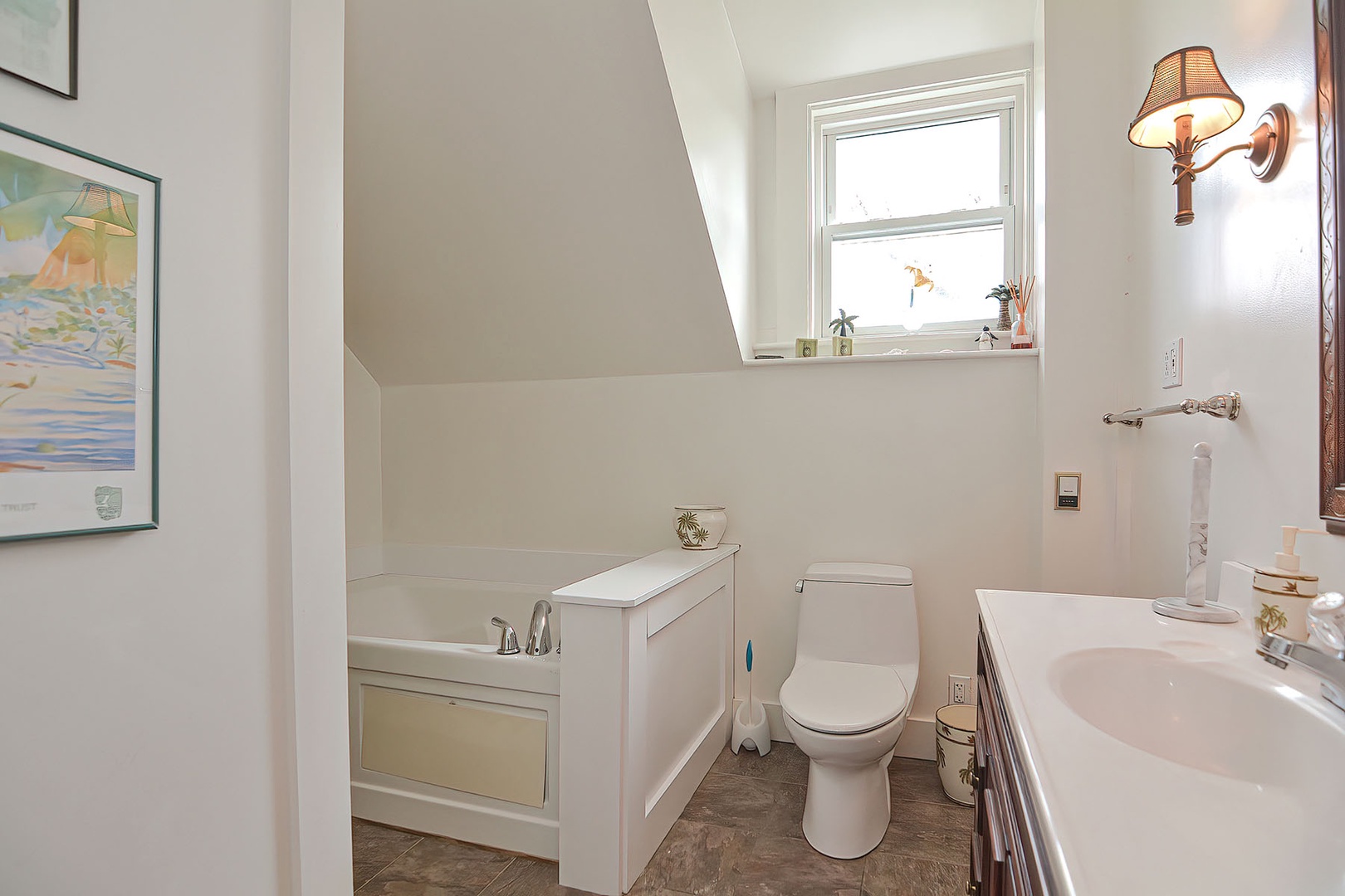 The shared full bath on the second floor includes a jetted tub.