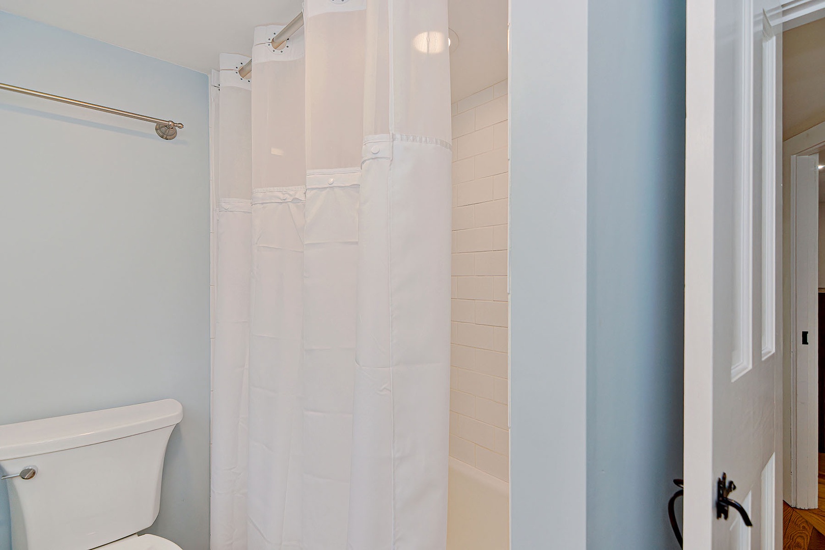 The upstairs full bath has a tub/shower combo.