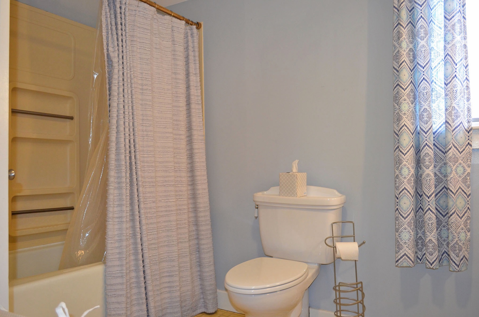 The second floor full bath has a tub/shower combo.