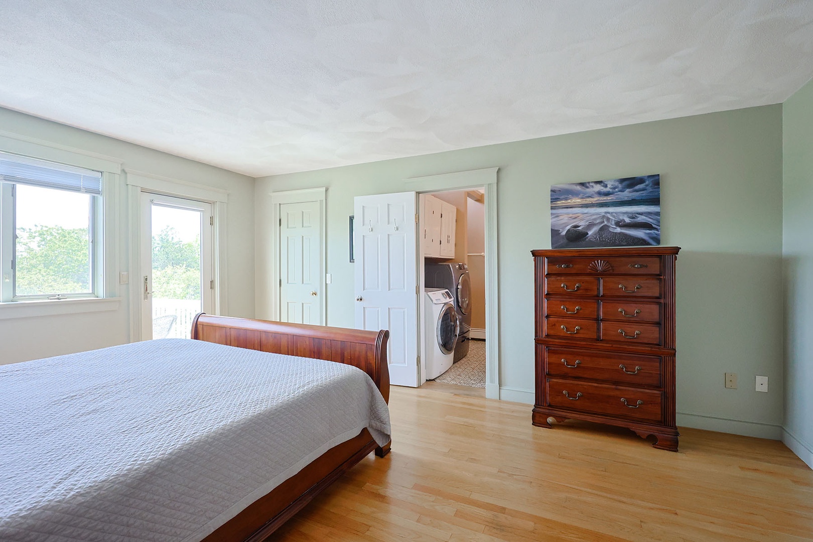 The laundry area is located in the ensuite bath.