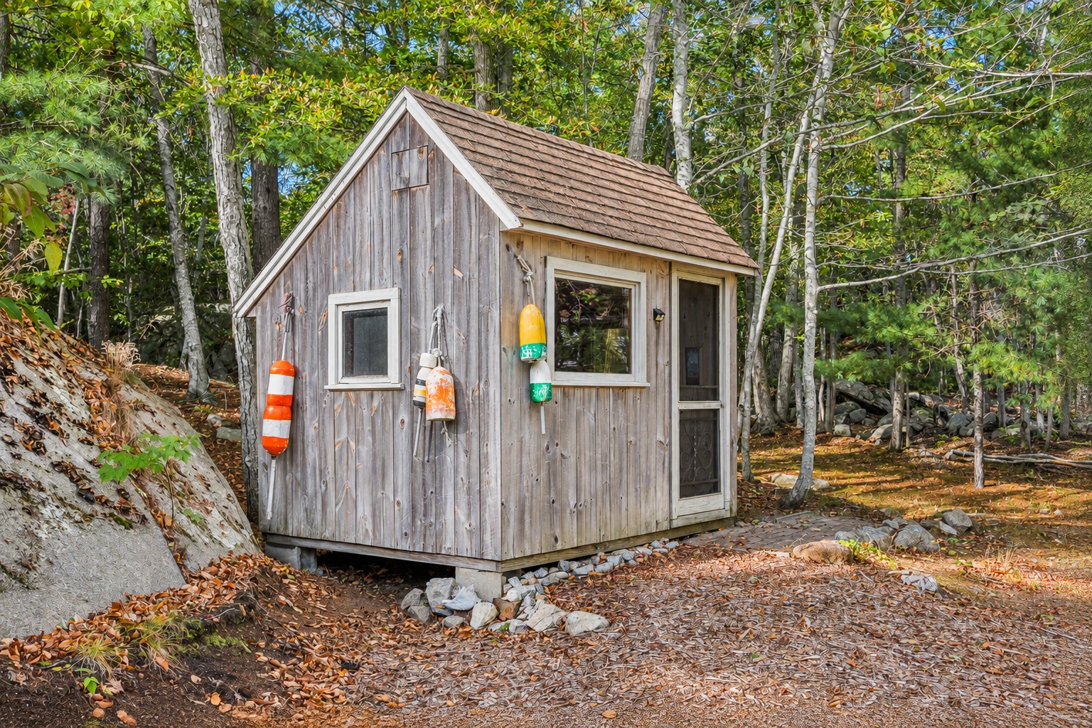 Small shed with supplies in the back.