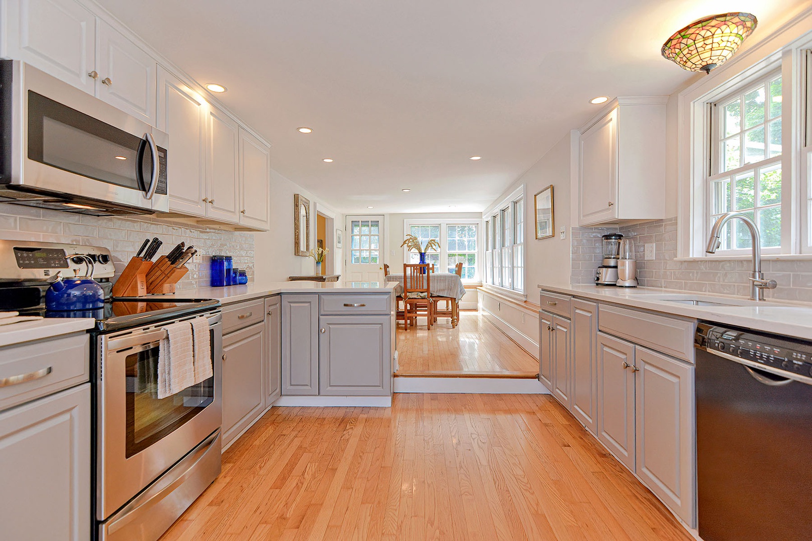 The kitchen looking toward the dining room.