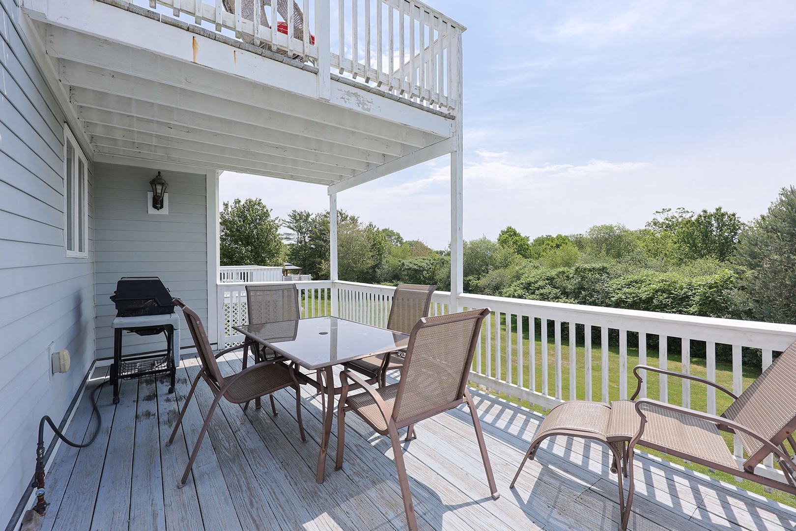 The grill is also located at the deck outside the kitchen.