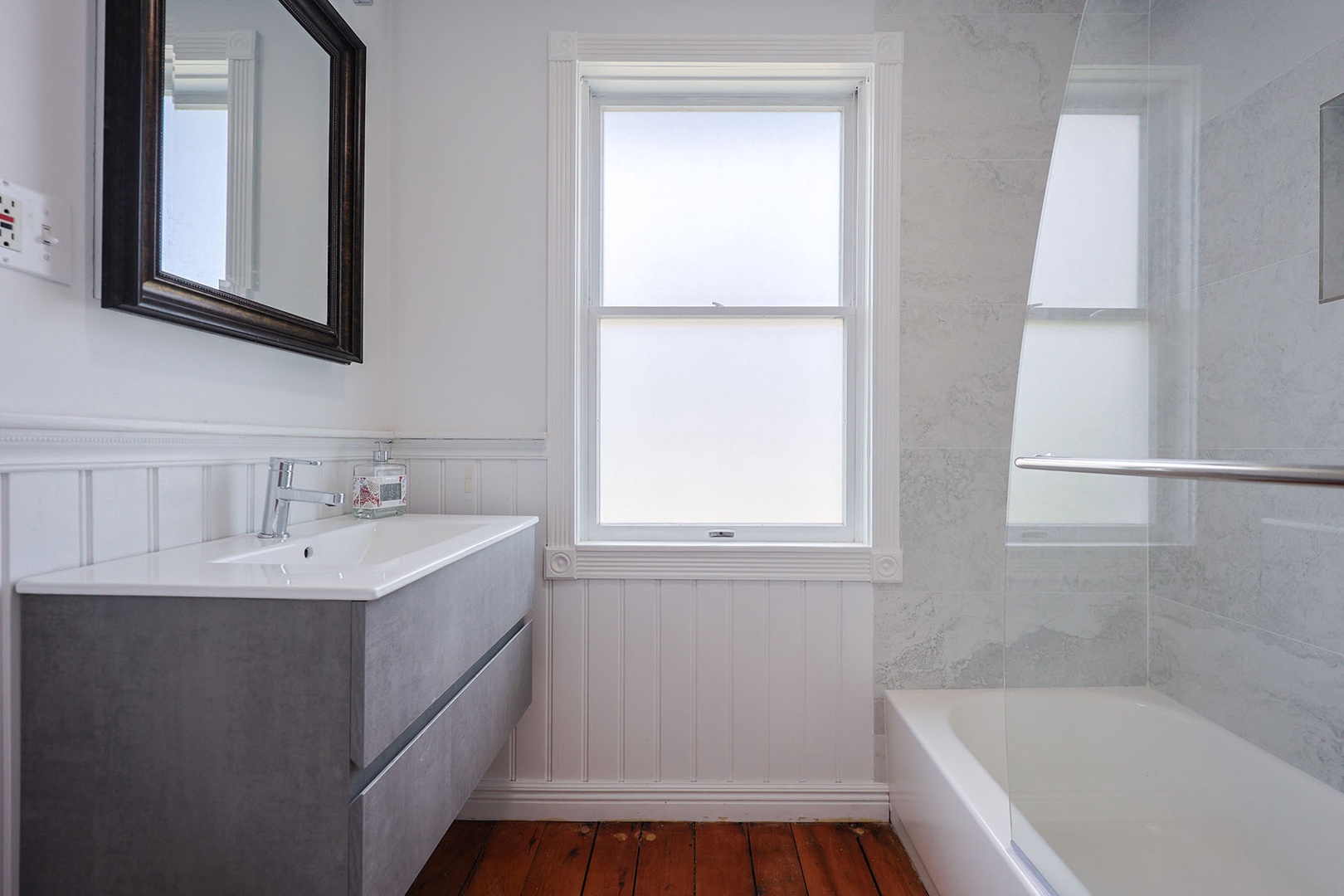 Ground floor full bath with shower and tub.
