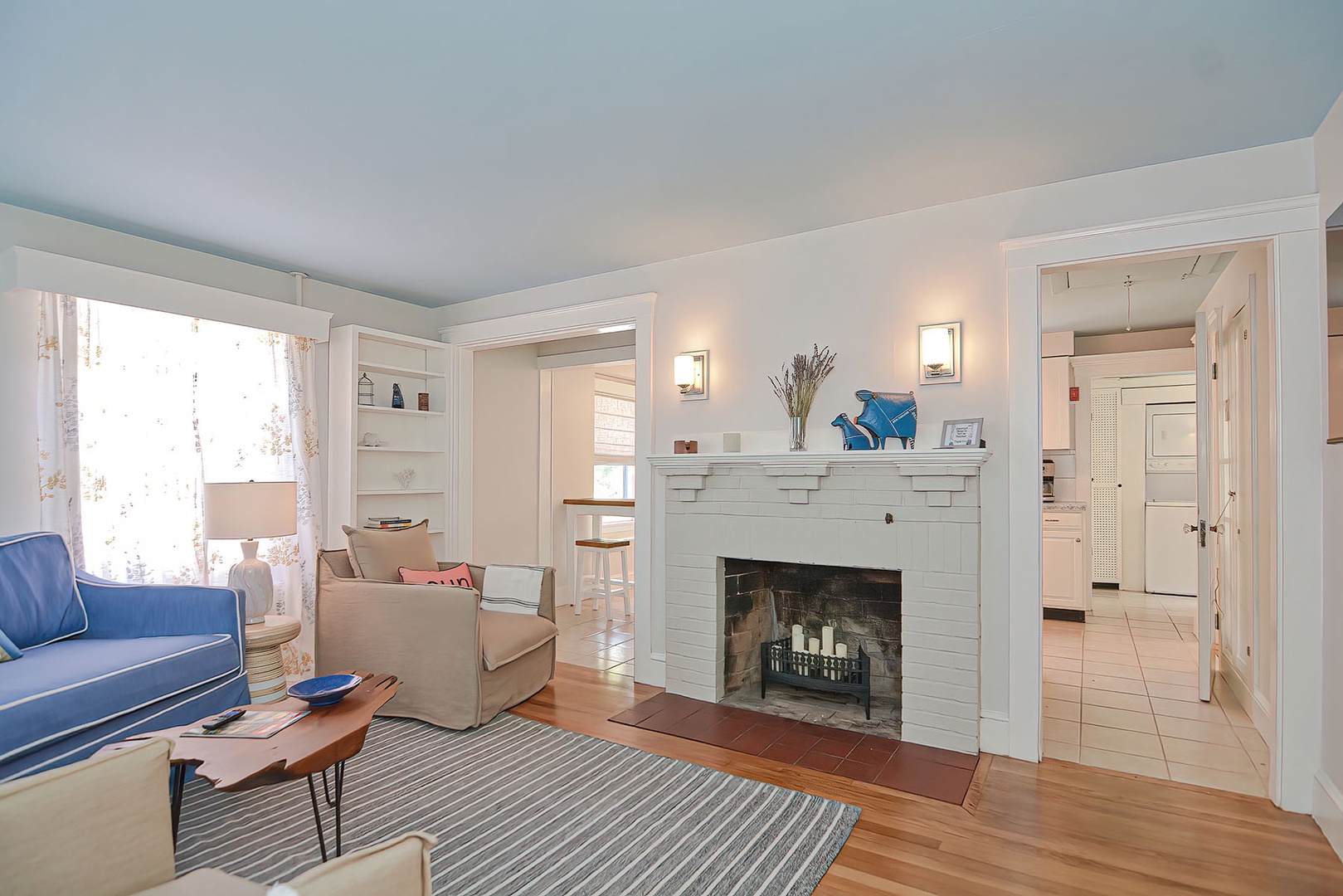 The living room is open to the kitchen via two doorways.