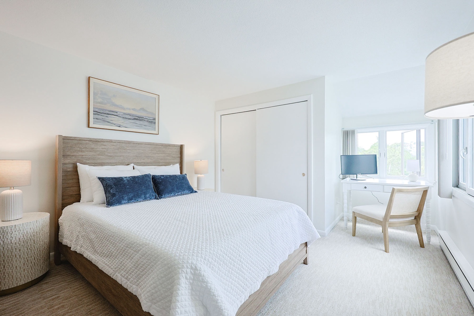 The primary bedroom has a dedicated workspace.