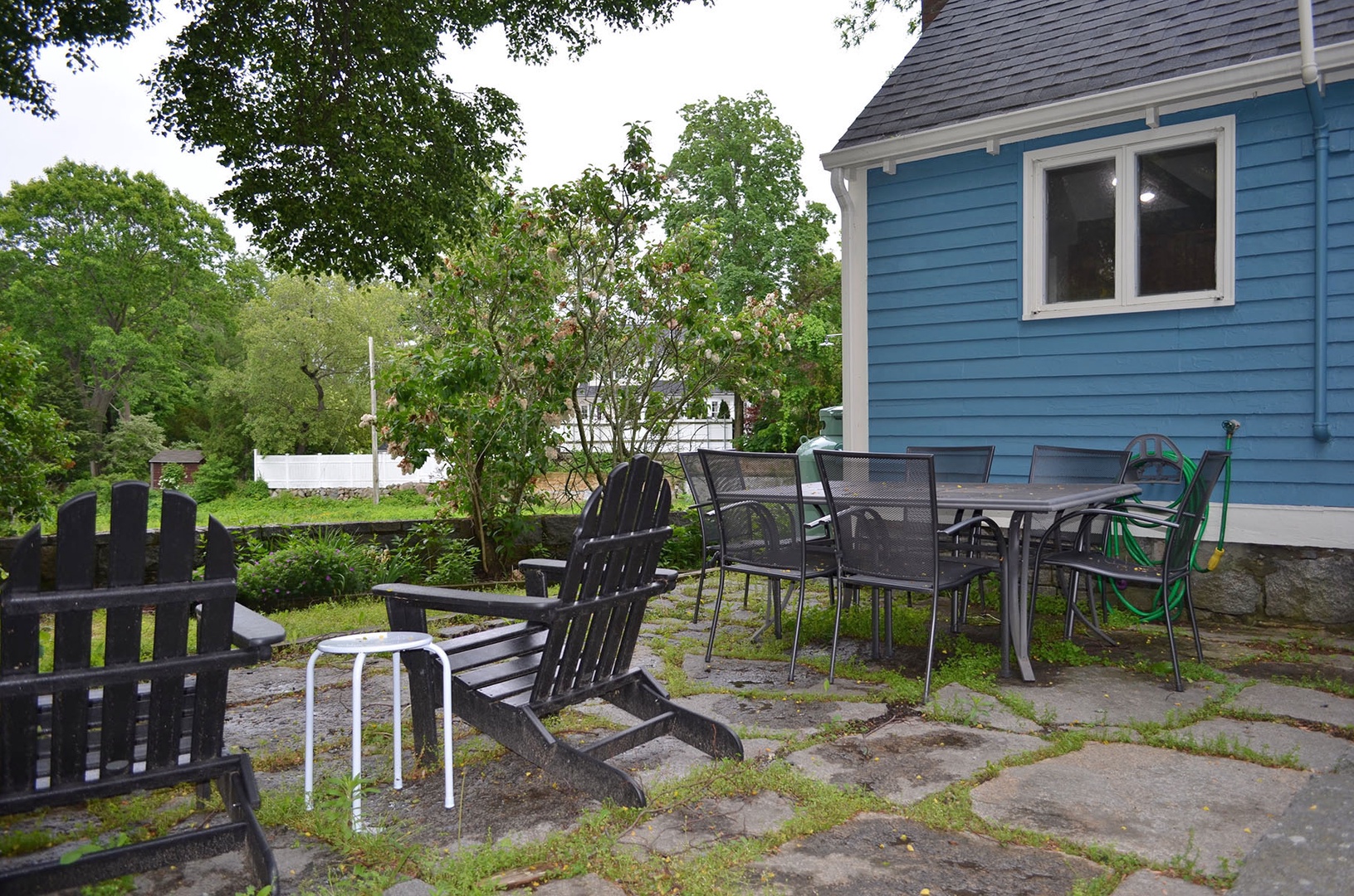 View of the back yard patio toward the house.