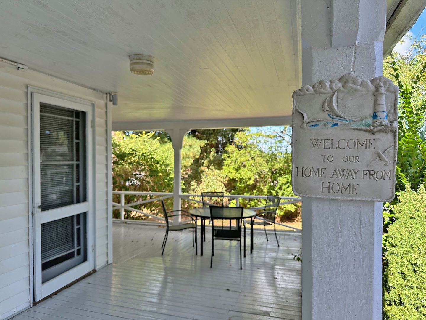 Another area for dining, on the kitchen side of the porch.