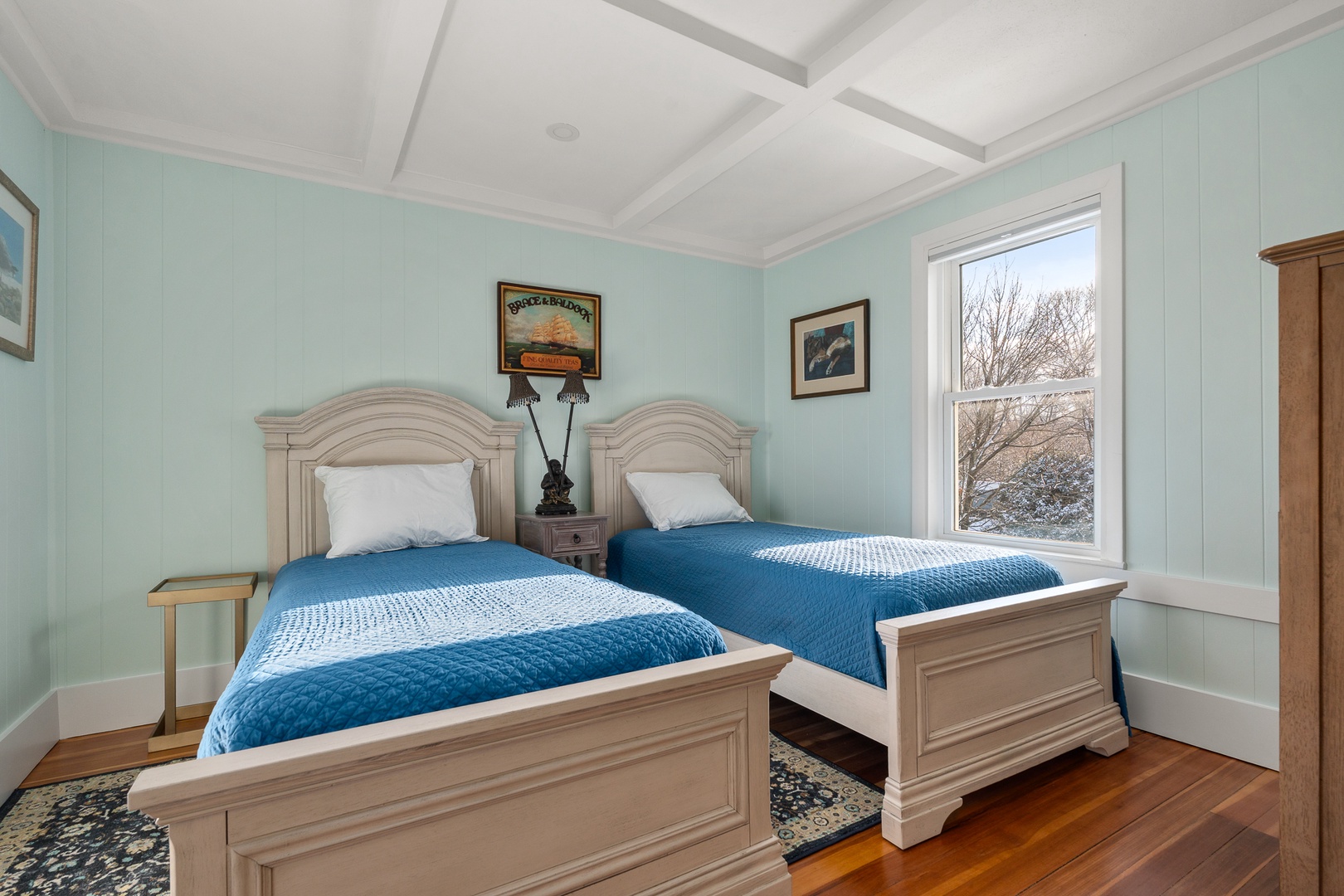 The third bedroom with twin beds on the upper floor.