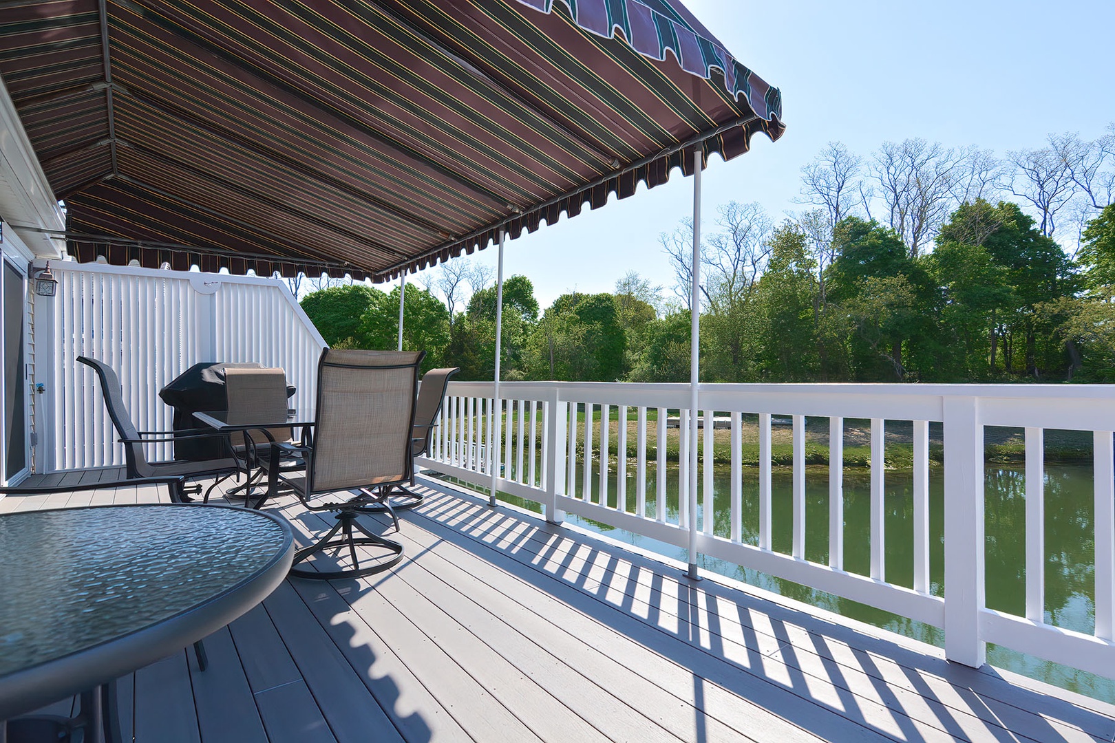 Outdoor dining area in the porch comfortably seats upto 6.