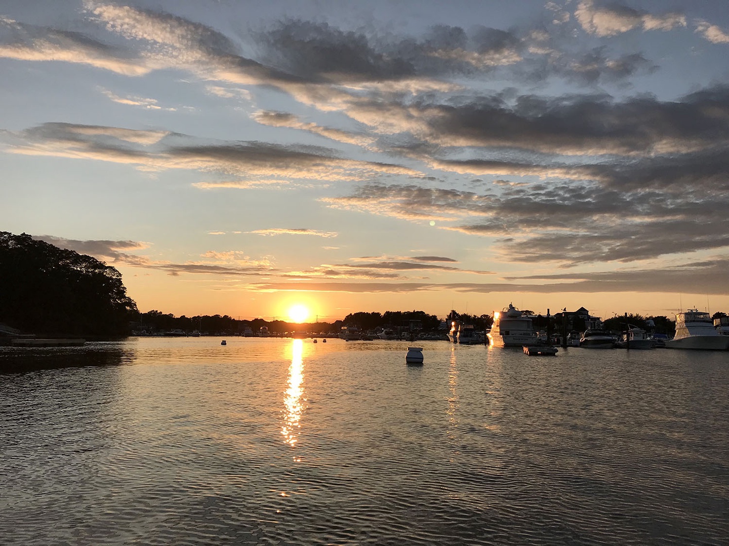 Soak up the beautiful views of the sunsets over Danvers River.