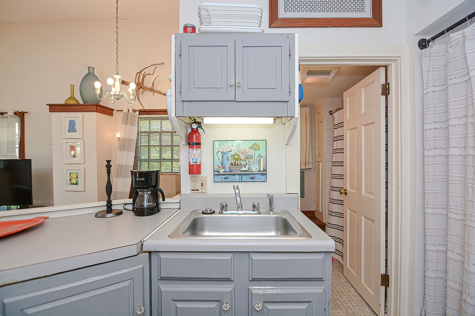 Kitchen sink and counter space.