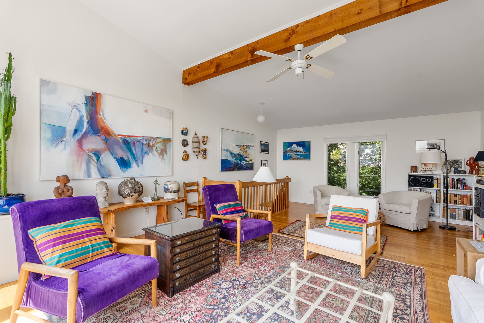 Front parlor is spacious with ample seating.