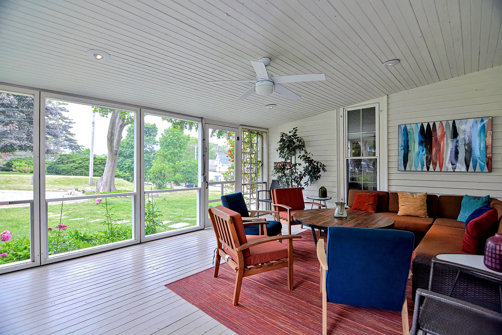 The screened porch is a wonderful place to gather and relax.