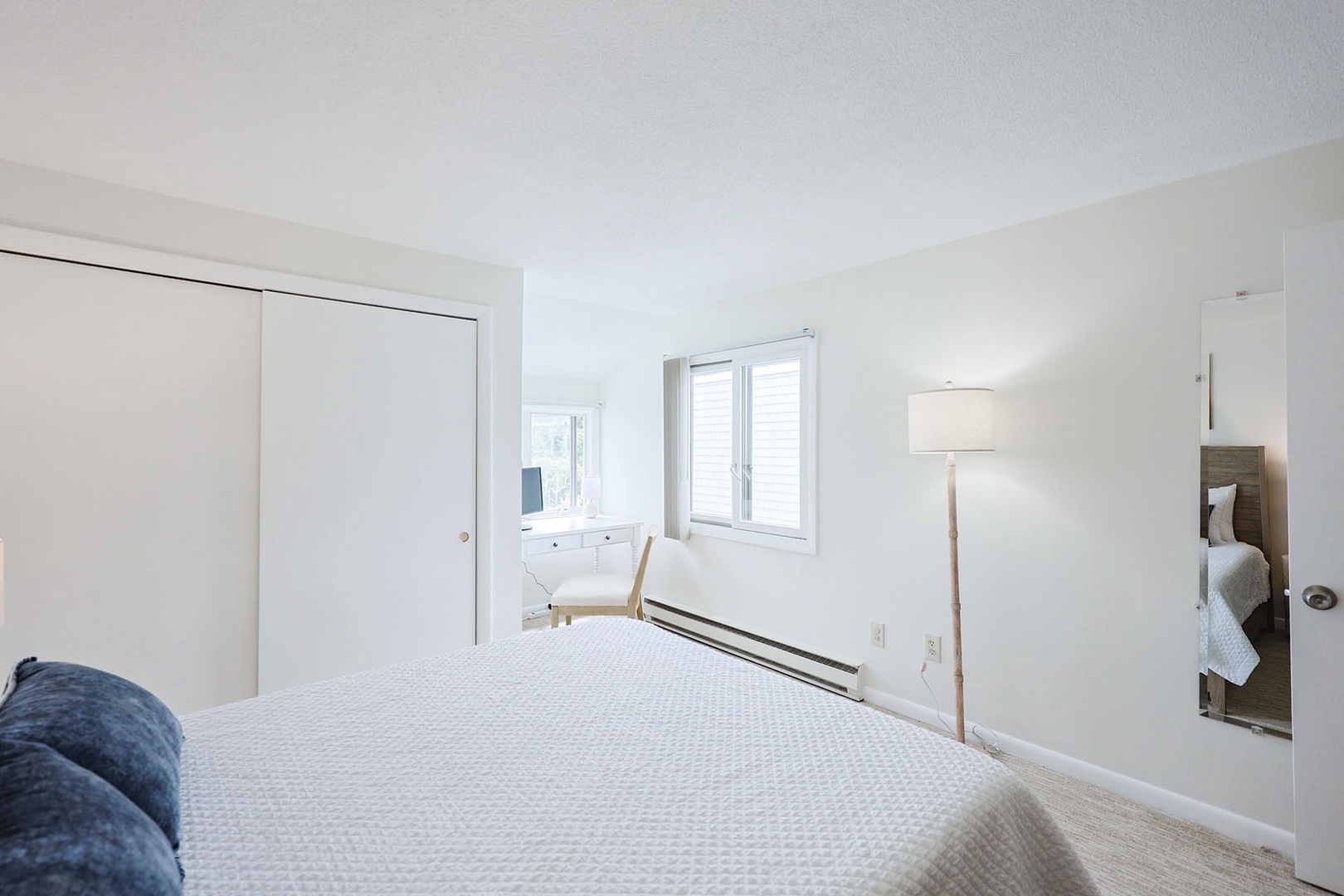 Another view of the primary bedroom.
