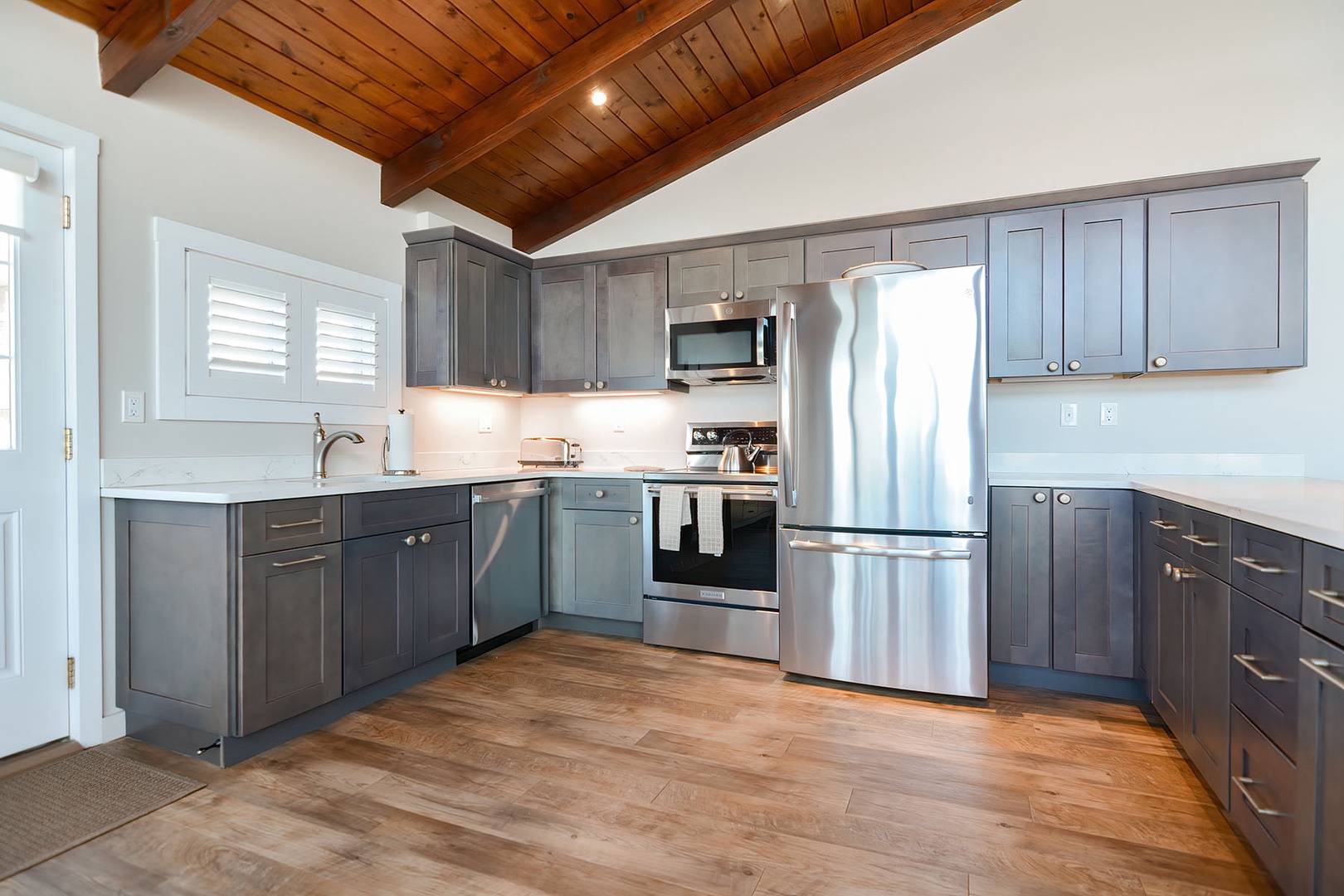 Modern, fully stocked kitchen.