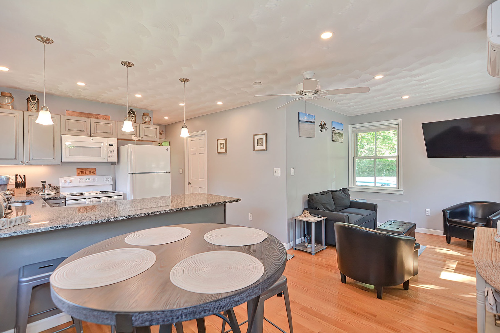 View from the dining area toward the living room and kitchen.