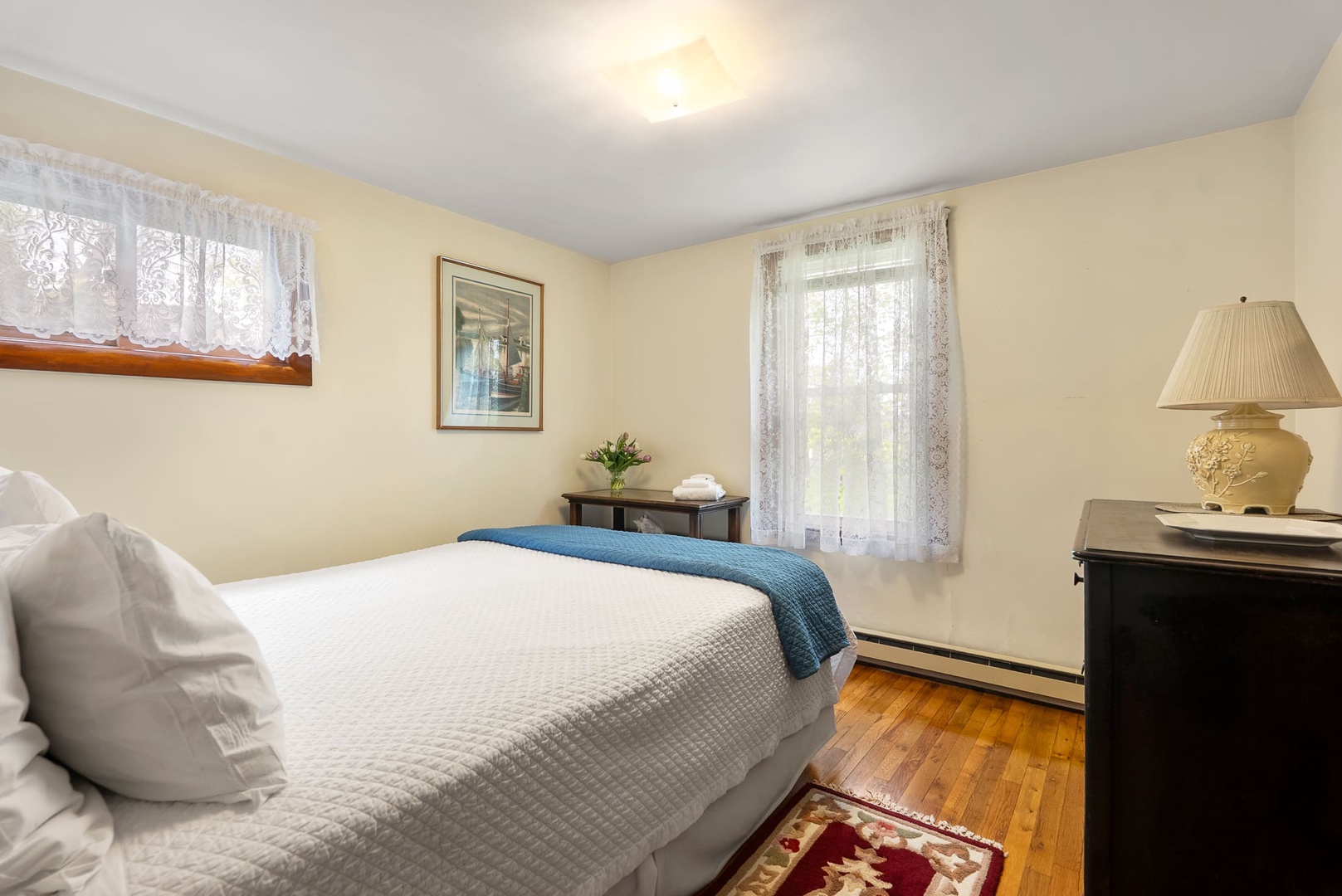 The second bedroom with a queen bed.