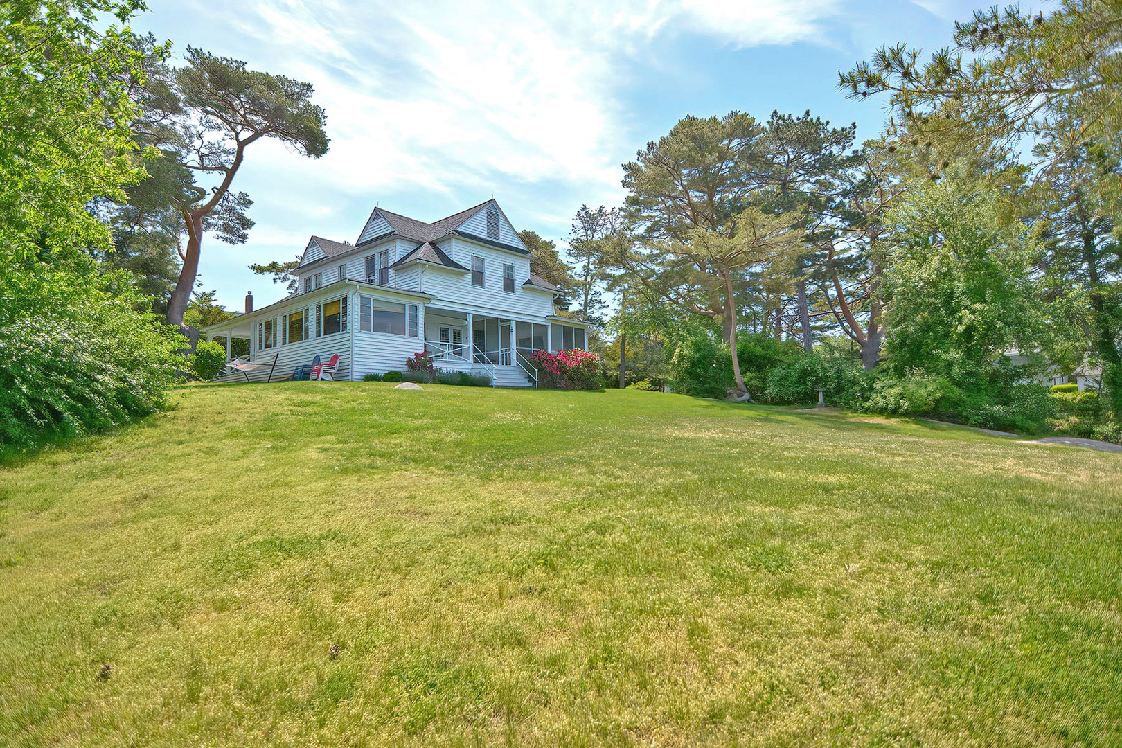 The large lawn is perfect for games or riverside picnics.