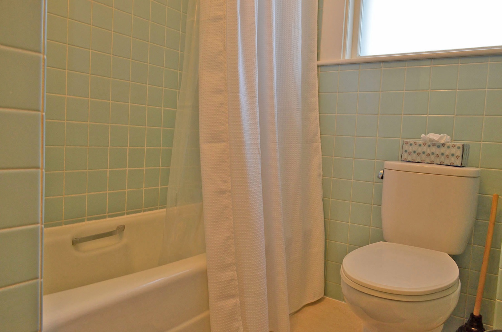 The Full Bath has a tub/shower combo.