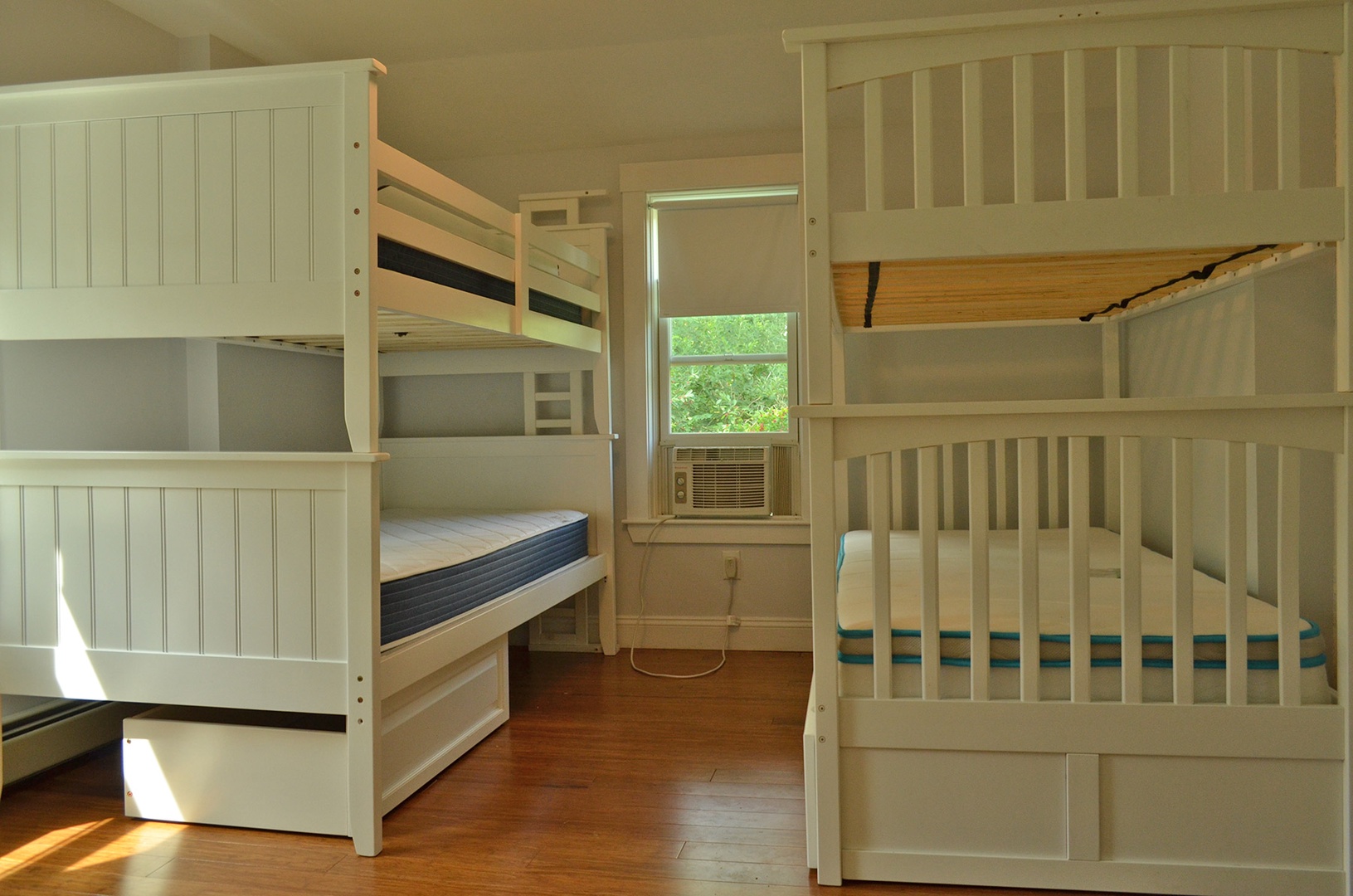 This bedroom on the main living level has two sets of bunk beds.