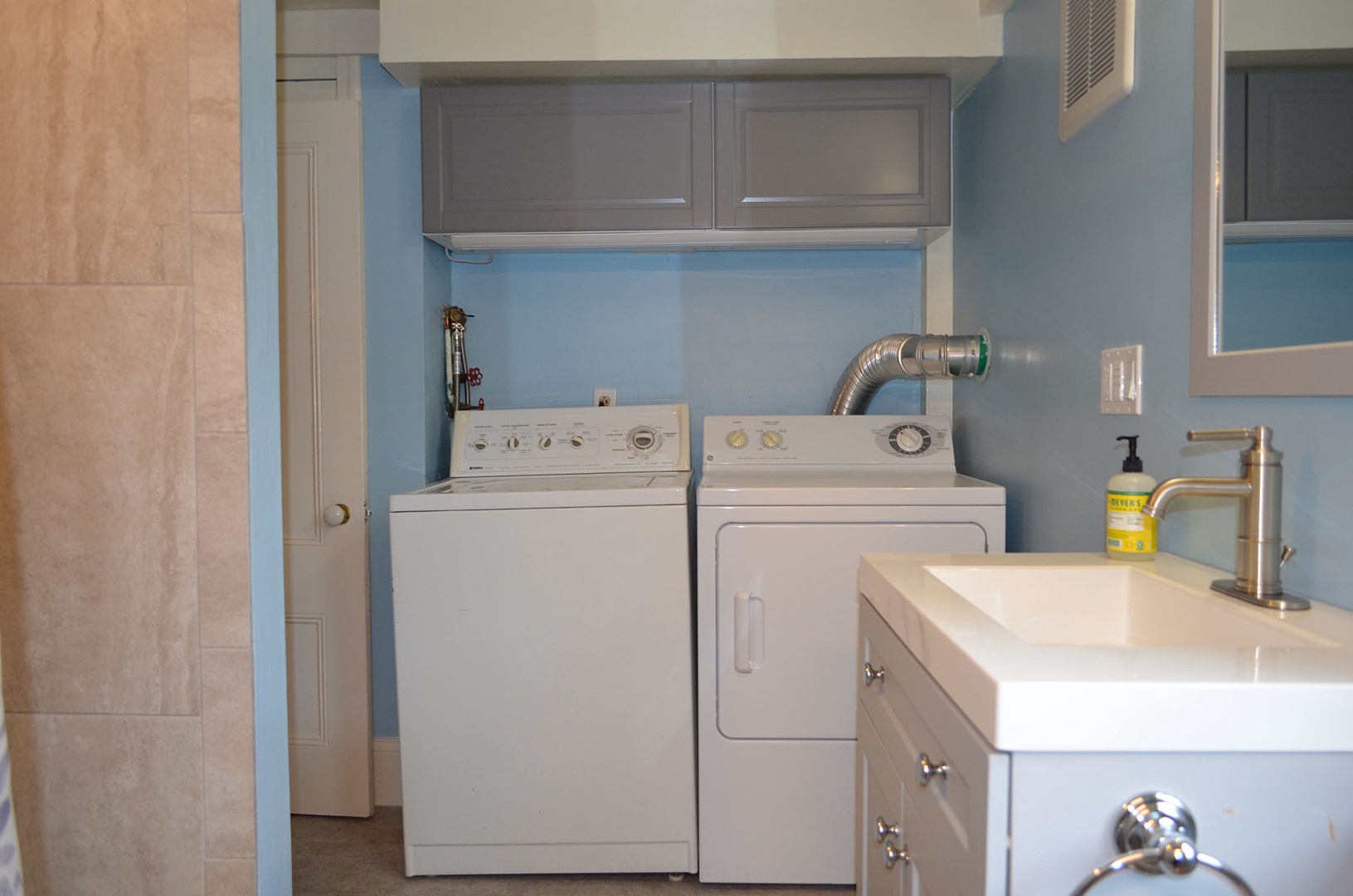 The washer/dryer units are located in the first floor full bath.