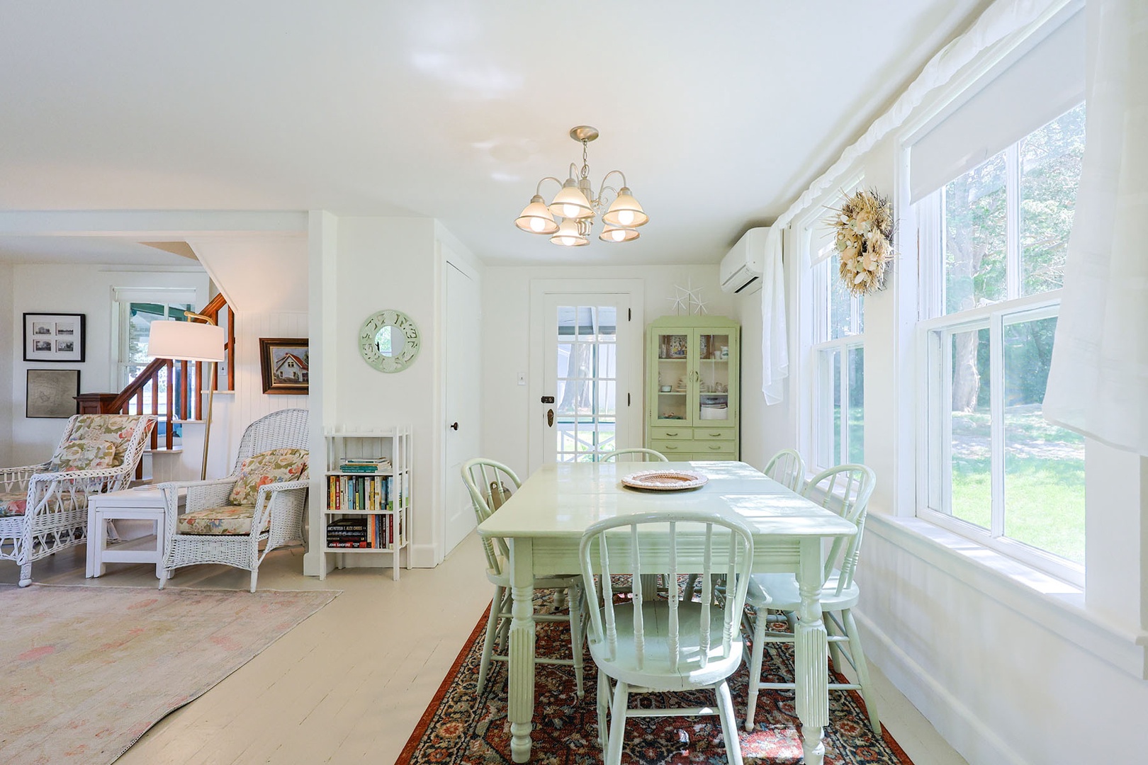 There is access to the screened porch from the dining area.