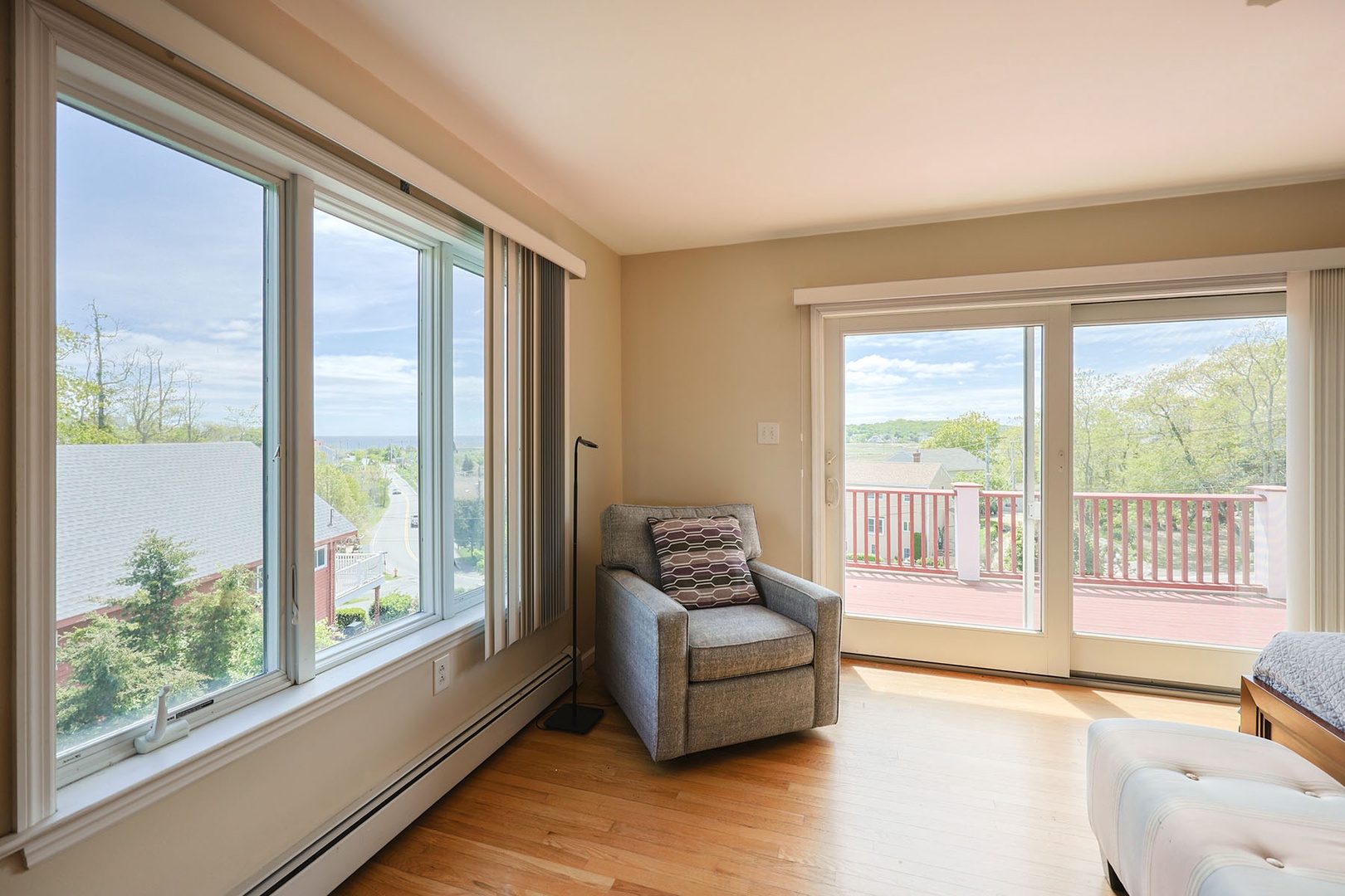 The primary bedroom opens out to the upper deck