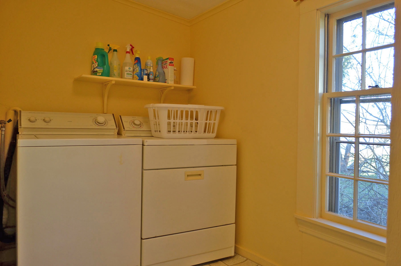 The laundry room is off of the kitchen.