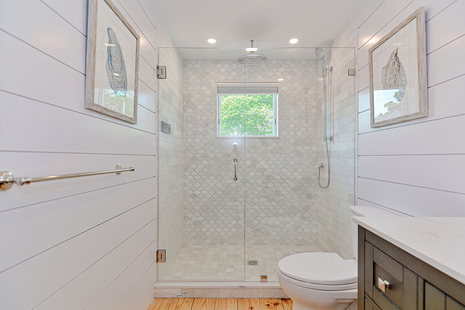 Primary suite bathroom with walk-in shower